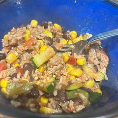 Changed this up some. Added rice as a filler, substituted fire roasted tomatoes for regular tomato, Eliminated the jalapeño and cumin. Added smoked paprika, garlic herb seasoning and onion powder vs diced onion. Quick easy go to meal
