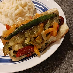 Added grilled mini cucumber 🥒,  grilled sweet onions,  red, yellow and green peppers,  and used regular hotdogs buns because we don't care for poppy seeds. It was delicious!!