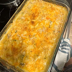 Additions:
Broccoli 
Carrots
Garlic power
Onion powder
Sprinkle of cheddar 
Dusted with seasoned panko crumbs 

Note for next time- 
Uncooked rice, 1/4 extra of liquid 
Chicken buillon
