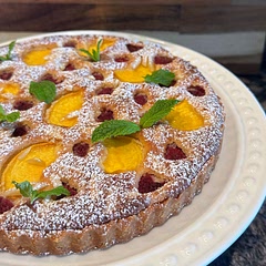 I am SO proud of myself!! 

The filling was fantastic. So delicious and not too sweet. I added 3 tsp of extra sweetener to sweeten it just a tad. I topped my tart with golden peach and raspberries and almond slivers. Added some confection sugar and mint to make it pretty. 

Since I had some leftover filling due to a shallower crust, I should have reduced the bake time. It came out a little more brown that I would have liked but I was pleased to find out the taste and texture was still wonderful :) So definitely not a picky filling.

This really impressed the crowd, I’m so pleased!