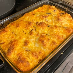 The recipe calls for two, 6 oz cans, not one 12 oz can. This is important so you have smaller biscuit bits and don’t get a glob of uncooked dough.