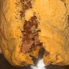 Really easy recipe! I recommend making a flat round patty with your dough, then put your frozen Nutella ball on top, after that make another dough patty on top!