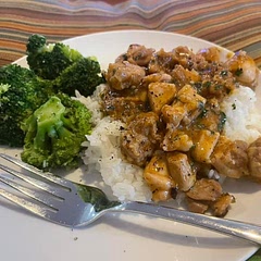 Seasoned chicken with salt, pepper, and chili powder after  the corn starch coating. Cooked up and tasty over white rice and steamed broccoli.