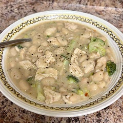 As several have mentioned, the recipe shown here is an excellent base to experiment with.
This time I chose to add chicken and broccoli (because it’s what I had on hand).
If you’d like to follow my lead, I suggest:
1. Add 1lb of chopped chicken (two breasts) to the med-high heated pot after adding olive oil. Give the pieces time to brown flip and brown the other side.
2. After adding the garlic and giving it time to heat, start adding the other ingredients starting with a small amount of stock. Take some time to scrape any fond left on the bottom of the pot, then added the rest.
3. After bringing everything to a boil and removing the lid, add the broccoli to cook for the remaining 15 min.
I’ll definitely be cooking this again! You’re really only limited by your imagination here.