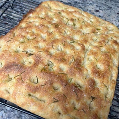I used dry active yeast instead of instant . I added 6 grams of it dry added to 1/3 cup warm water to activate it. Then I reduced the amount of water the recipe called for (2cups ) by 1/3 cup since the activated yeast had 1/3 cup water in it.