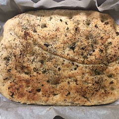 I didn’t have garlic cloves but had garlic paste so mixed that with the olive oil that goes on top prior to baking and brushed it on. Added some fresh green and purple basil as well.