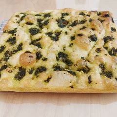 Made half the recipe, but didn't have the exact right size pan equal to an one-eighth sheet pan, so it's a bit flatter than it ought to be, but I am still super impressed with the recipe! 