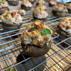 Had enough filling for about 28 baby bellas, including the tiny ones. Delicious. I used red onion because I already had a half cut in the fridge.