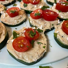 Used a whole cucumber (sliced just under 1/4” each) and roughly 10 grape tomatoes cut into thirds (putting 1-2 pieces of tomato on each bite). Also used about 5oz of smoked humus, easily could have used more. Very tasty.