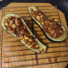 I love this recipe so much that it was the first thing I made with the first zucchinis that came out of my garden this year. Added a little bit of salsa to the beef, and I mixed the cheese in with the beef so that it wasn't all melting off the sides. Absolutely delicious!