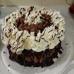 Add fresh 1 1/2 cups fresh cherries to make a blackforrest cake and decorate with whipped cream