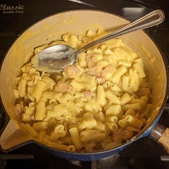 Very cheesy!! I added bacon to mine as well as I wanted some meat but it is delicious, I will make this again. I didn't bake my in a tray in the oven as I don't like it crispy on top