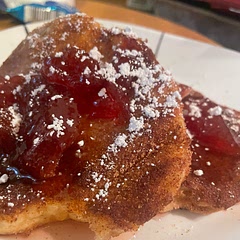 To stay a little more true to the name: pancakes baked per normal instructions. Quickly dipped in melted butter and coated with cinnamon sugar. We used strawberry preserves and a sprinkle of powdered sugar