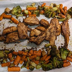 I actually baked the chicken on a separate pan but it had a lot of liquid left after cooking so I served everything from the veggie pan. Also tossed the veggies in some of the balsamic/dressing mix for the last 10 or so minutes of cooking.