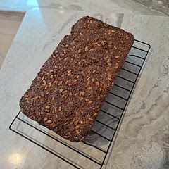 Almost dropped it when taking it out of the oven, didn't expect it to be so heavy! Very crumbly when cut, so I'd suggest cutting over a tray to avoid seeds flying everywhere!
