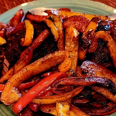 We don't like onions,  so I  substituted more peppers and used elk steak rather than beef. It had a very nice blend of spices  
