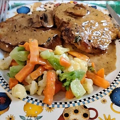 This was really good. Pork chops were so  tender!  Served with veggies in cheese sauce. 