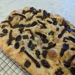 Sun dried tomatoes, kalamata olives, pesto