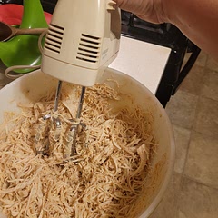 Thanks t to grandma!  Best kitchen hack ever.  Shredded in under 2 minutes on low and moving around.