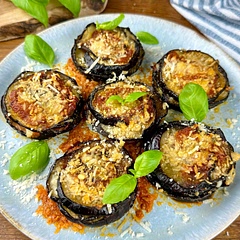 You can prepare the layered aubergines in advance and bake just before serving for a convenient appetiser or side dish.