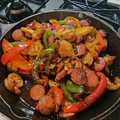 I added one pack each of sazon vegetable and meat seasoning to the peppers and sausage. 