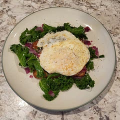 Over easy egg because I'm no good at poaching them. Red onions instead of tomatoes and parmasean instead of feta. Great breakfast!