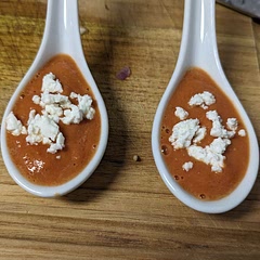 Topped with goat cheese and served in one-bite spoons! Made with San marzano tomatoes in place of fresh tomatoes.