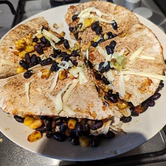 Nice and spicy, just the way I like it. I needed more cheese especially for the last batch. I soaked the dried black beans thoroughly but I still needed to cook them thoroughly as the skillet wasn't enough. Not sure the flatbread used was the right thickness but I had limited options. Overall, would make again