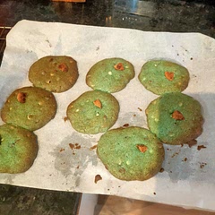 I added white chocolate as well as milk chocolate chips and honestly they are the best cookies I've ever made and tasted, don't be afraid to be a bit generous with the butter and sugar 

(also I tried to dye them blue hence why they are green)

