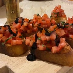 I skipped on the Parmesan step to save some time. Just rubbed some garlic and olive oil on the bread. The balsamic glaze really brought it home