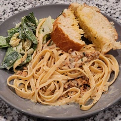 Added 1lb of spicy Italian sausage after the olive oil and before the butter. Also substituted the pasta with fettuccine and skipped the pasta water. It's good, and a new go to.  🤌