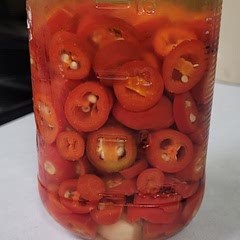 I cut the sugar to 1 tbsp.  I used red jalapeños. Very pretty. 