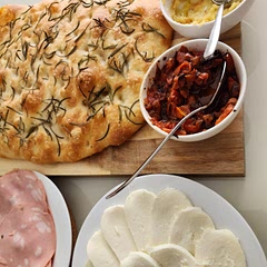 Easy to do an amazingly soft and tastefull, I served it with roasted garlic and roasted tomato spread, buffalla mozzarella, prosciutto, and mortadella, this is a redo for this weekend.