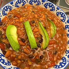 We added pinto beans and doubled the spice. Also added a habanero to kick it up a notch. Needed to increase water by about a cup.  Excellent meatless option.