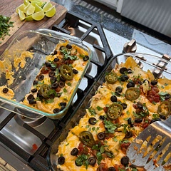 Used 2 rotisserie chickens. Put jalapeños on top as well as black olives mixed in & on top. It’s legit the best at home enchiladas we’ve had!!