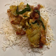 Served over rice and the flavor is stellar. Next time we will try substituting chicken thighs instead of breasts.