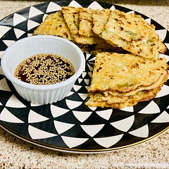 Simple to make once you get the hang of cooking the pancake just thin enough to be crispy and thick enough to be fully cooked flavorfully. Excellent with the dipping sauce!