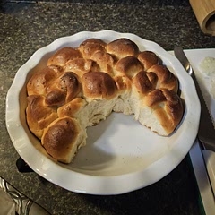 Couldn't get a picture fast enough! I didn't have a bundt pan so put in a pie dish. Added a bit of garlic powder & Italian seasoning. SO good. 
