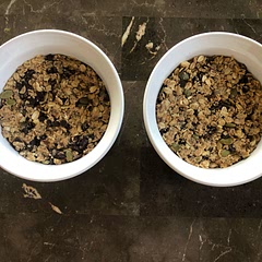 I like to use these recipes as a starting point. I added about 1/8 cup pepitas and 1/4 cup of chopped lightly salted mixed nuts. I did a mix of honey and stevia/agave because I need to use that up. And last ingredient change was using mini chocolate chips instead of dark chocolate as I was out. Didn’t want to roll them into balls so pressed into dishes and will cut after set.