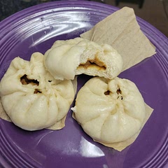 Delicious!! Effectively took me four hours lmao and as you can see i was not able to master the fold. Also difficult to cook them right - the batch i took a photo of were ones i cooked on a wire rack in a pot of water on the stove. But I also made another batch in my instant pot's steamer setting and those were a disaster lol. but with all the difficulty, this is a recipe I look forward to trying to master