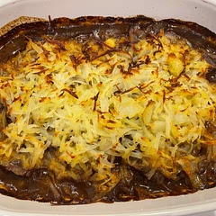 Big hit with everyone. Cook potatoes in advance and leave in fridge - easier to grate if cold. 

I made a few minor adjustments to make it dairy and gluten free. Used potato starch instead of flour and olive oil instead of butter.
