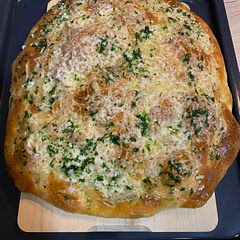 I am addicted to focaccia. I love it. It is more easier to make it that I thought. I love garlic and cheese so it was no doubt that I have to try it. I made is for my friends and everybody was so impressed. Thank you!