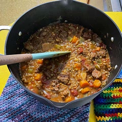 I make this all the time now. I like to brown some big chunks of sausage to add, but you don’t have to. Hand crushing the tomatoes is also fun. It’s great with a bit of Greek yogurt over the top as well.