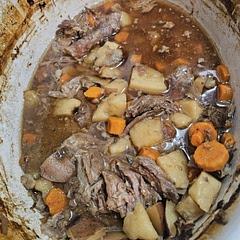 Made it in the crackpot until the meat fell apart about 5/6 hours. I forgot the celery, but this tastes sooooo good. I'd rather use  the crackpot, though. 