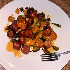 I used smoked cheddar sausage and added thyme and pumpkin pie spice. AMAZING! Will definitely be making this again!