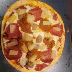 For 6 Pita breads, use a whole bottle of white sauce and a whole can of Pineapple tidbits.

TIP: Place the pieces on a dish with a twirl fan design for a nice touch when serving company or as party appetizers.