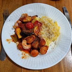 Made with debreziner sausage, prawns and on creamy polenta. Delicious! 
