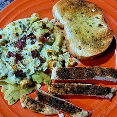 Excellent! Made with garlic, chicken ravioli and homemade basil pesto sauce. Baked a garlic, paprika, topped, chicken breast and served with basil butter compound french bread.