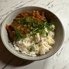 I roasted the pumpkin, used tinned chopped tomatoes, added spinach and served it with a coconut rice. Really beautiful. The pumpkin had a lovely roasted flavour but was slightly overcooked.