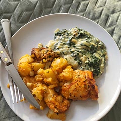 I changed a bit. I dipped the chicken in a oil that was mixed with paprika. Then I placed on the top of the potatoes. The oil also covered the potatoes and added a hint of paprika taste. It was delicious :) 
